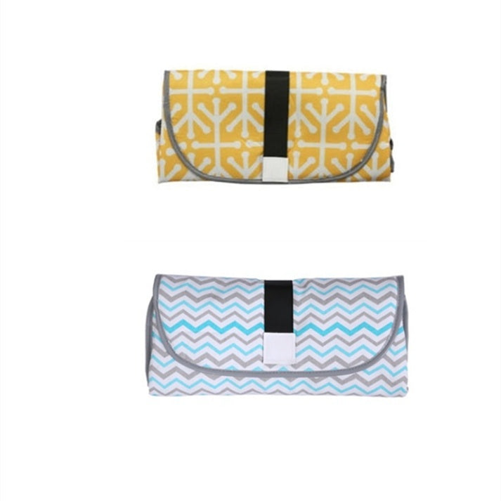 Convenient baby changing pad 34ae3394-7f1e-4fab-94ea-7a9f05bf0ad9